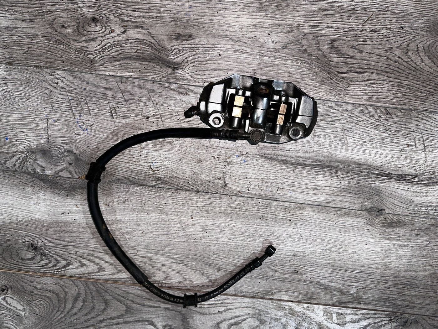 2003 2004 SUZUKI GSXR1000 LEFT FRONT BRAKE CALIPER