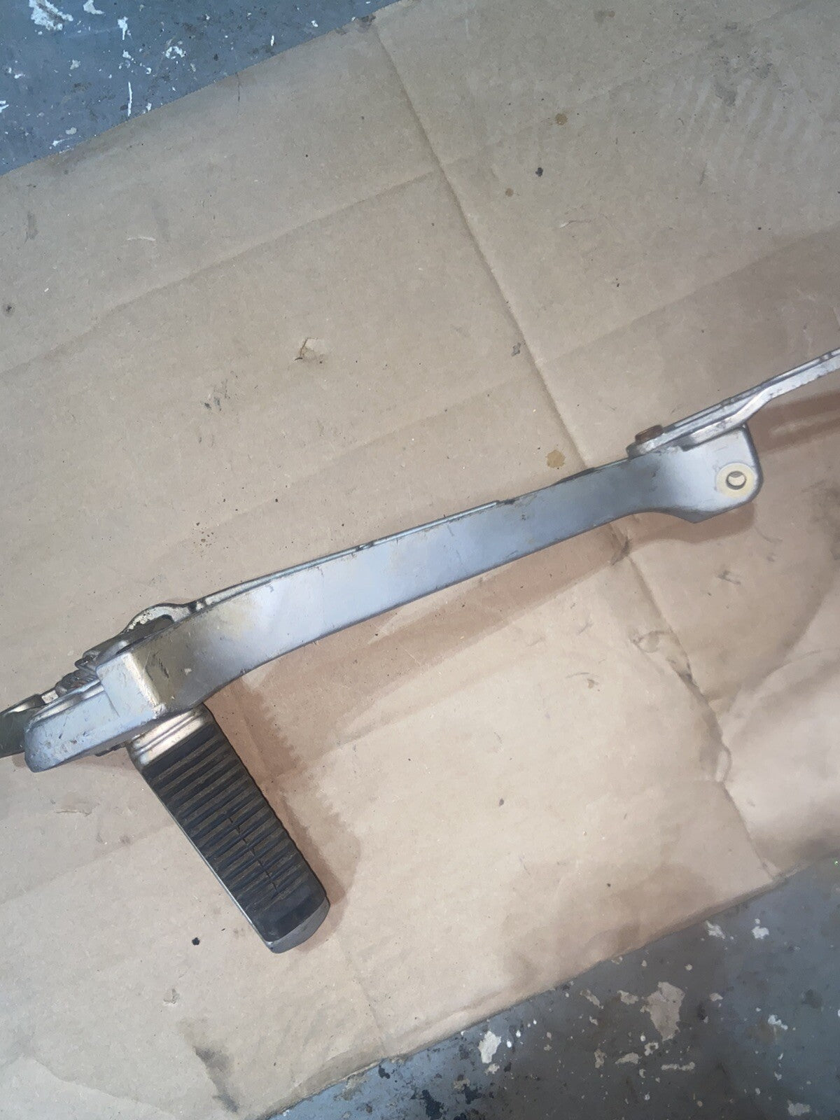 Suzuki GS550 OEM LEFT FOOT PEG REAR-SET BRACKET