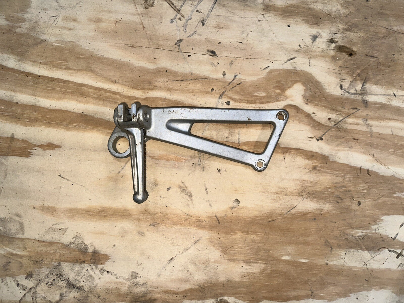 01 Ducati Supersport 750 750SS Left Rear Peg & Bracket