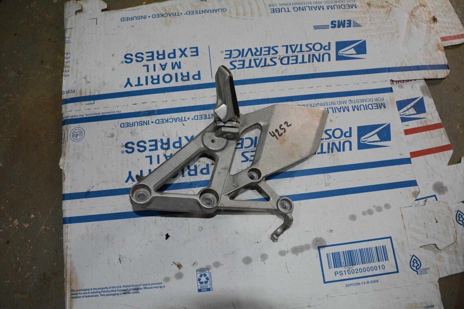 94 Honda CBR 600 CBR600 F2 F 2 front right foot rest peg and mount bracket