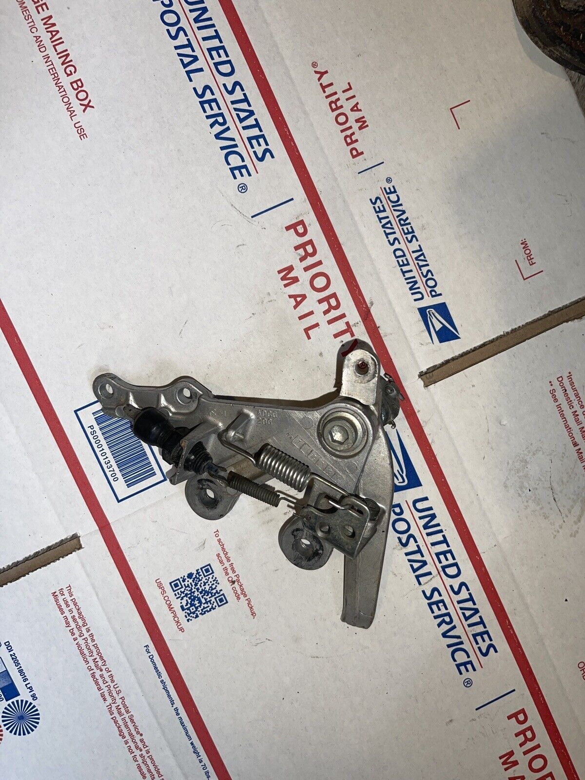 2004 Suzuki GSXR750 Right front foot peg bracket, brake pedal bracket