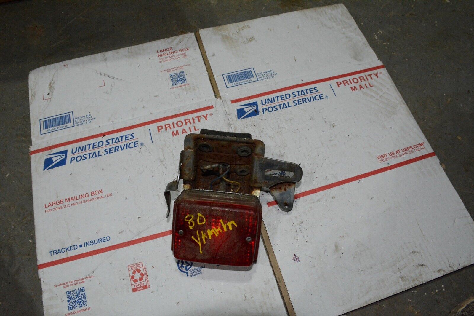 1972 Yamaha DS7 RD250 rear brake tail light with mount bracket