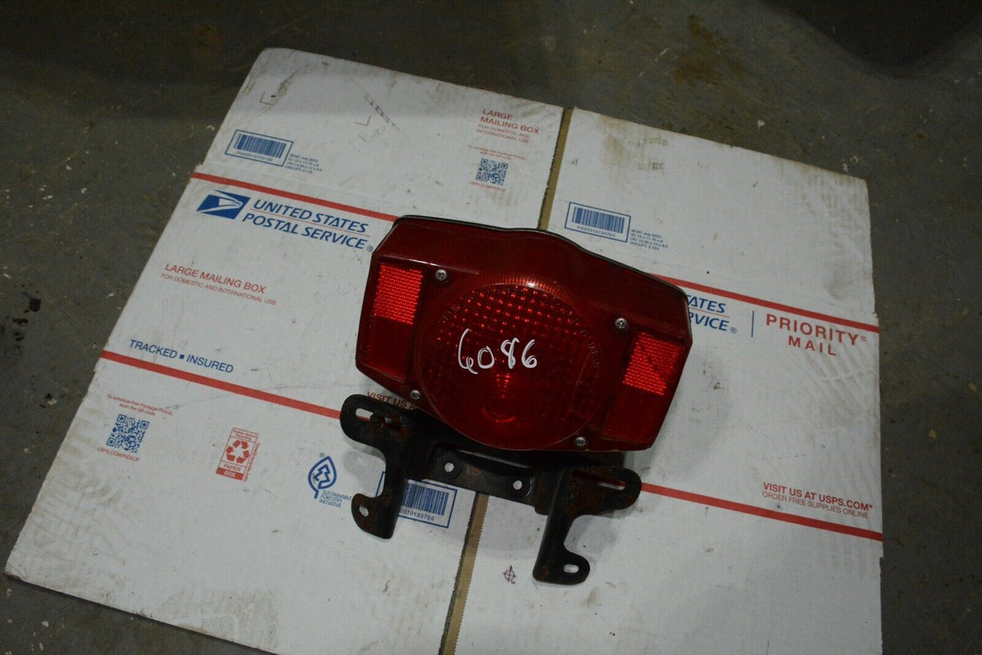 1975 Honda CB360 Twin rear brake tail light with mount bracket